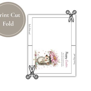 May include: A greeting card with a watercolor illustration of a hedgehog next to a pink daisy. The card has the text "Happy Easter" and instructions to print, cut, and fold. The card is white with a decorative border.