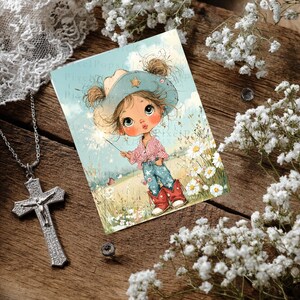 May include: A rectangular print featuring a cartoon illustration of a child wearing a blue cowboy hat, a red and white striped shirt, blue jeans, and red cowboy boots, holding a sparkler in a field of white flowers under a blue sky.