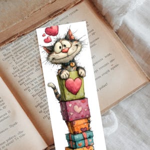 May include: A whimsical bookmark featuring a cartoon cat perched atop a stack of colorful gift boxes. The cat, with a joyful expression, holds a heart-shaped box. Floating hearts add to the cheerful design, perfect for book lovers.