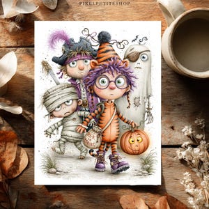May include: A rectangular art print featuring a group of four cartoon characters dressed for Halloween: a mummy, a pirate, a ghost, and a child in a tiger costume holding a pumpkin bucket with a bag labeled Trick or Treat.