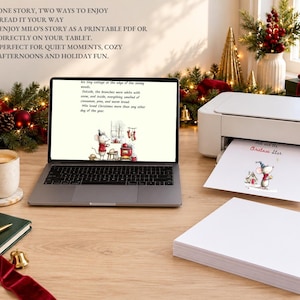 May include: A laptop displaying a story about a mouse, a white printer outputting a page with a mouse illustration, and a stack of white paper. The text on the screen reads: His tiny cottage at the edge of the snowy woods. Outside, the branches were white with snow, and inside, everything smelled of cinnamon, pine, and warm bread. Milo loved Christmas more than any other day of the year.