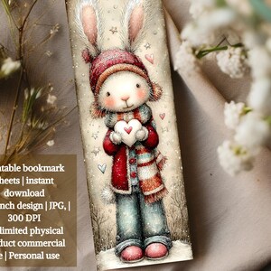 May include: A whimsical bookmark featuring a bunny character in winter attire, holding a heart. The bunny wears a red hat, scarf, and coat, with blue jeans and pink boots. The bookmark design is 2x6 inches and includes the text: Printable bookmark sheets | instant download.