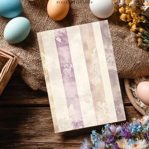 May include: A set of three ceramic mugs with a speckled, matte finish. The mugs are in shades of cream, light brown, and dark brown. Each mug has a simple, minimalist design and a rounded handle.