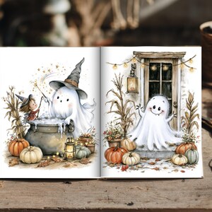 May include: An open book displaying two watercolor illustrations. The left page shows a small figure and a ghost in a witch hat stirring a cauldron with pumpkins nearby. The right page features a ghost standing before a doorway with pumpkins.