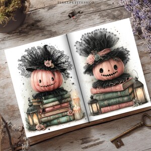 May include: Two illustrations of a pink pumpkin wearing a black lace witch hat, perched atop a stack of vintage books. Each scene includes a glowing lantern and lit candles, rendered in a soft watercolor style with delicate black lace details.