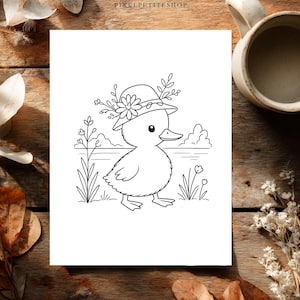May include: A black and white line art illustration on a white rectangular sheet featuring a duckling wearing a hat adorned with a flower and foliage. The duckling stands in a grassy area near a body of water with small clouds in the background.