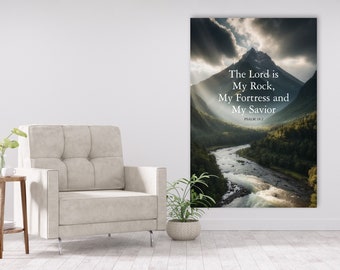 May include: A canvas print with a mountain range and a river flowing through it. The text "The Lord is My Rock, My Fortress and My Savior Psalm 18:2" is printed on the canvas.