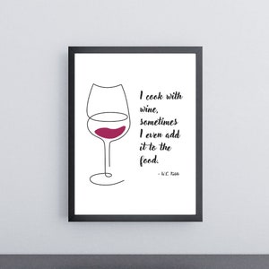 May include: A black framed print with a white background and a black and white line drawing of a wine glass with red wine. The text reads "I cook with wine, sometimes I even add it to the food. - W.C. Fields"