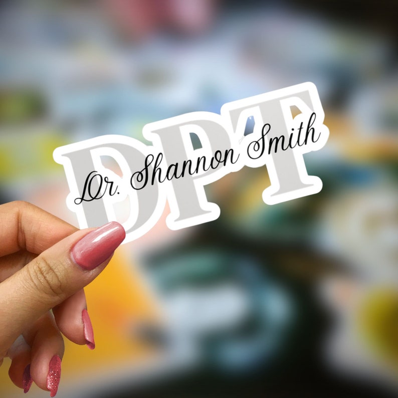 May include: A white sticker with the text "Dr. Shannon Smith DPT" in black cursive font.