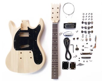 May include: Unfinished electric guitar kit with a natural wood body and black pickguard. Includes a neck, hardware, and electronics. The kit features a body, neck, pickups, tuning pegs, bridge, and various screws and components for assembly.