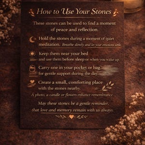 Grief support healing stones set informational cards from AuraBox displayed on a dark warm background with candlelight and dried flowers. The cards explain the meaning of Amethyst, Rose Quartz, Amazonite, Jade and Topaz crystals used for emotional healing, remembrance and comfort during loss. Memorial crystal gift set guide for sympathy, bereavement support and peaceful reflection.