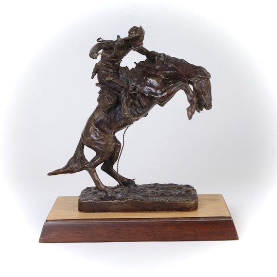 Frederic Remington, Broncho Buster. Bronze Replica Statue on Wooden Base, Franklin Mint. 7 inches tall.