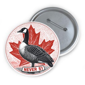 May include: A round button with a black and white illustration of a Canada goose in front of a red maple leaf. The text "NEVER 51" is on a banner at the bottom. The button has a silver pin back.