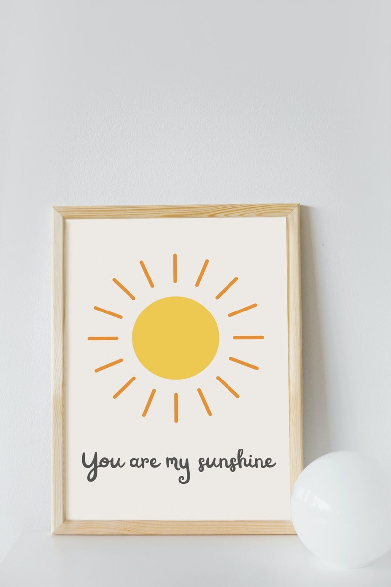 Heartwarming 'You Are My Sunshine' digital print featuring a vibrant sun, perfect for a nursery or playroom. Instant download to brighten your child's space with love and positivity.