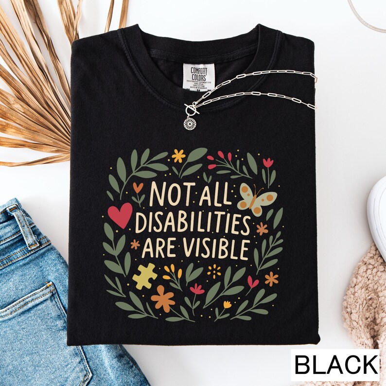 a t - shirt that says not all disabilities are visible
