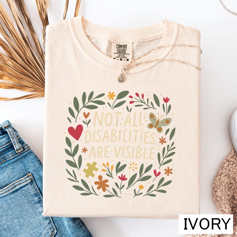 a t - shirt that says not all disabilities are visible