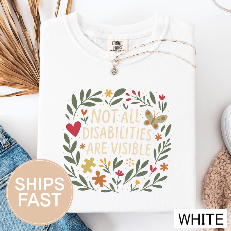 a t - shirt that says not all disabilities are visible