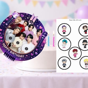 May include: A white frosted cake with a purple and black BTS-themed cake topper. The topper features a photo of the band, the words "HAPPY BIRTHDAY", and a microphone. Also included are seven circular character stickers.