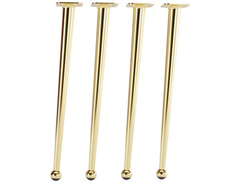 May include: Four gold metal table legs with a rounded top and a square base.