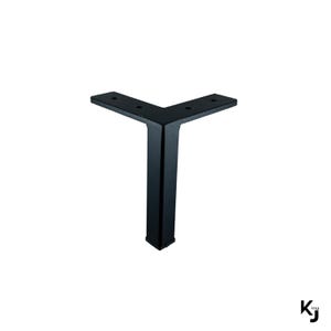 May include: Black metal L-shaped table leg with a square base. The leg is approximately 12 inches tall.