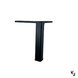 May include: Black metal table leg with a square base and a rectangular top.