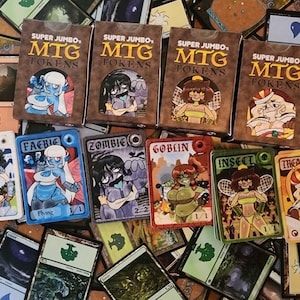 May include: Four brown boxes labeled Super Jumbo's MTG Tokens are displayed above a collection of individual trading cards. The cards feature various illustrated characters, including a faerie, zombie, goblin, insect, and treasure, with text labels.