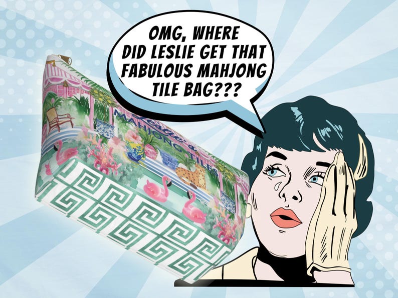 A comic-style illustration of a woman with gloved hands and a speech bubble saying, “OMG, where did Leslie get that fabulous Mahjong tile bag?” The featured bag has a pink and green tropical design and showcases the green greek key coordinating pattern on the bottom panel.