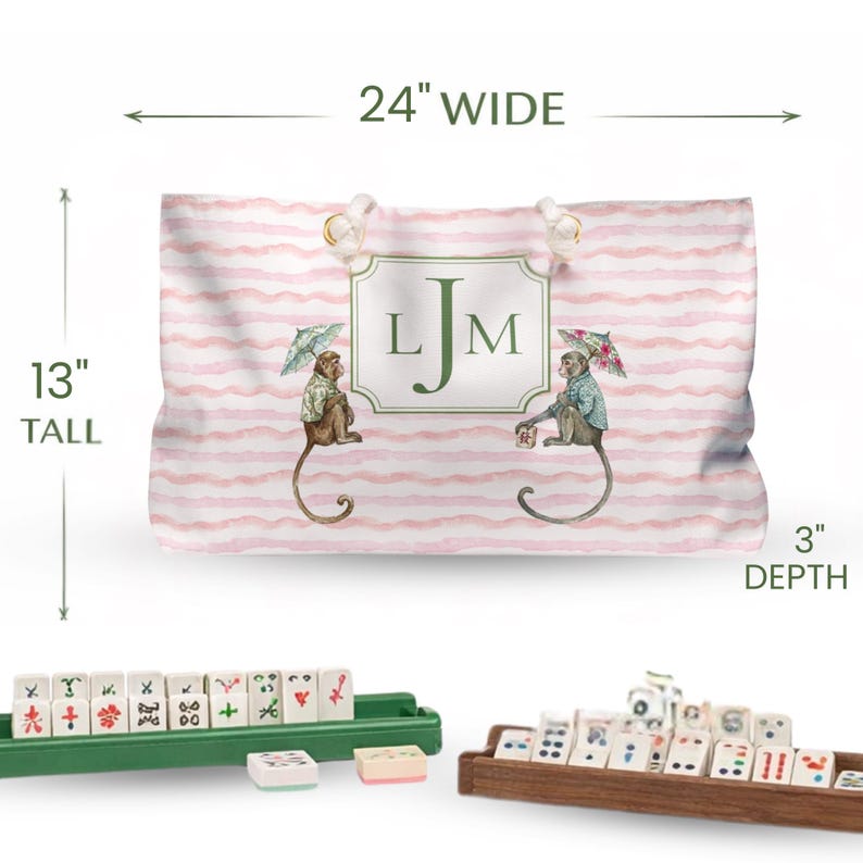 Pink and Green Monkey Mahjong Tote Bag and Tile Pouch Set on a white bamboo table, Palm Beach style