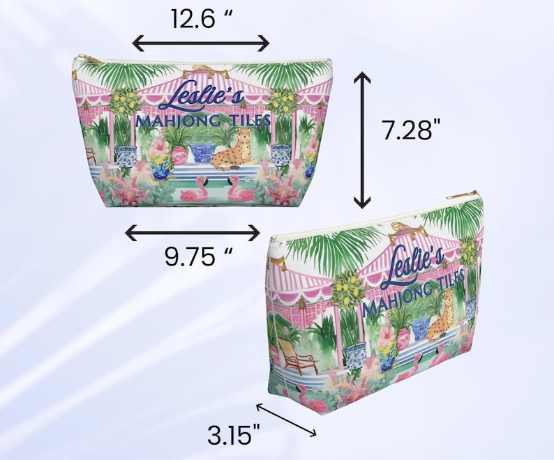 A tropical print preppy Palm Beach style personalized Mahjong tile bag shown from two angles with size measurements marked. The personalizable custom bag design includes flamingos, greenery, and a cheetah under a striped canopy.