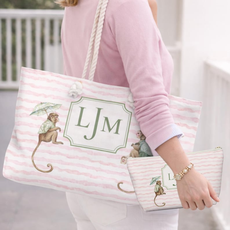 Pink and Green Monkey Mahjong Tote Bag and Tile Pouch Set on a white bamboo table, Palm Beach style