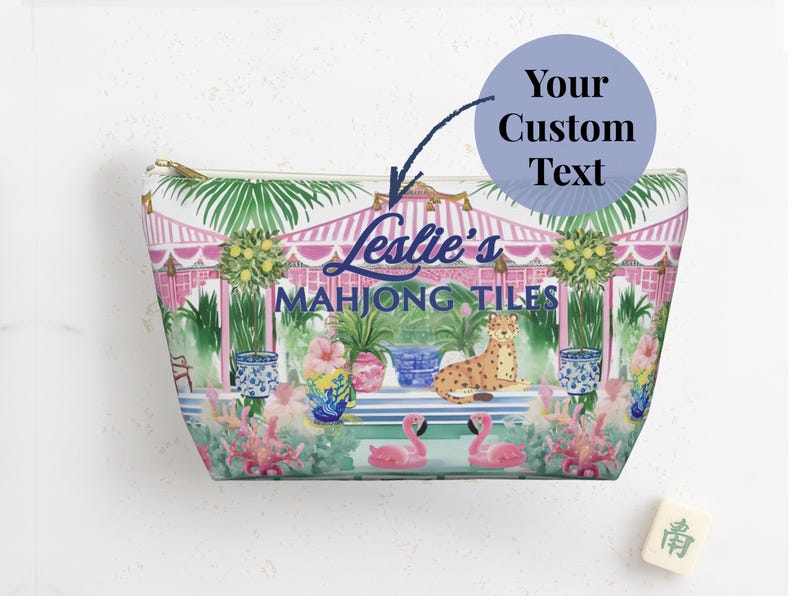 A personalized Mahjong tile bag with tropical artwork. A round label points to the text area where a custom name can be added above the words “Mahjong Tiles.”