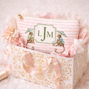 Pink and Green Monkey Mahjong Tote Bag and Tile Pouch Set on a white bamboo table, Palm Beach style