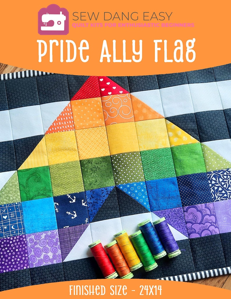 May include: A Pride Ally Flag quilt with a rainbow triangle design, featuring red, orange, yellow, green, blue, and purple squares. The quilt is 24x14 inches and includes spools of thread in matching colors. The text "Pride Ally Flag" is displayed.