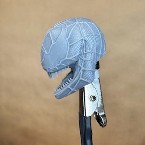 Custom VENOM resin Head, inspired by the Raimi Spider-Man movie. Sculpt by JCirion3d, and produced by me in my Los Angeles studio. 
Side view.