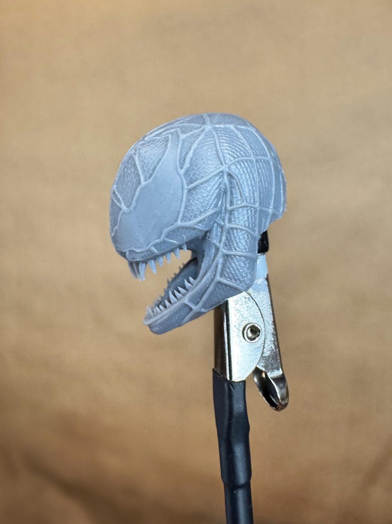 Custom VENOM resin Head, inspired by the Raimi Spider-Man movie. Sculpt by JCirion3d, and produced by me in my Los Angeles studio. 
Side view.