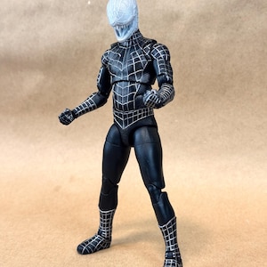 Custom VENOM resin Head, inspired by the Raimi Spider-Man movie. Sculpt by JCirion3d, and produced by me in my Los Angeles studio. 
6 inch version on a Legends figure.