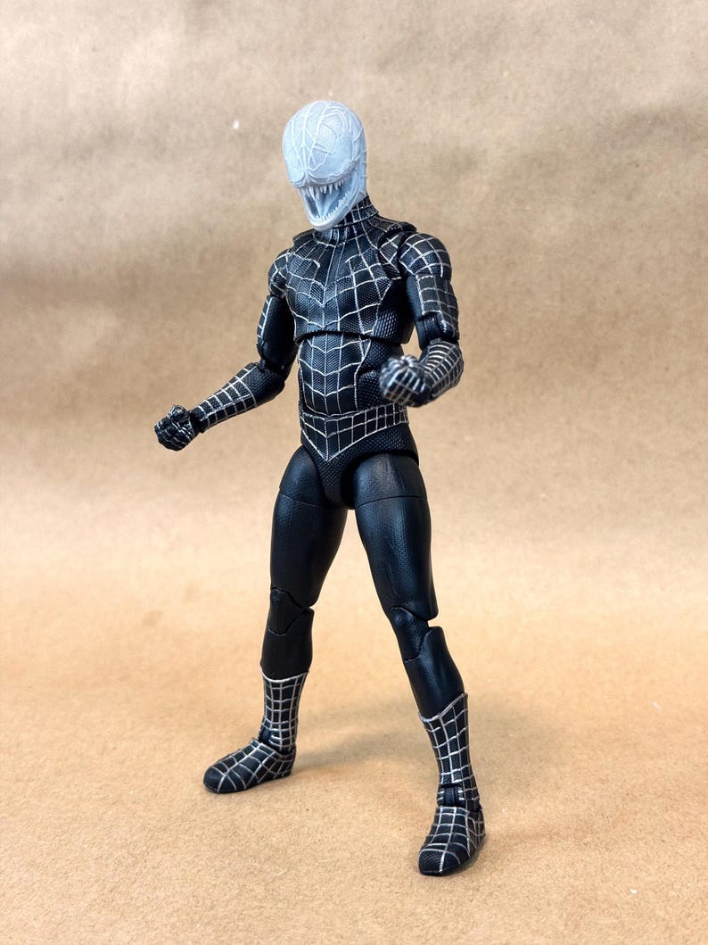 Custom VENOM resin Head, inspired by the Raimi Spider-Man movie. Sculpt by JCirion3d, and produced by me in my Los Angeles studio. 
6 inch version on a Legends figure.
