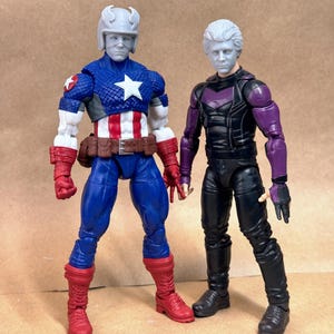 Custom Captain America 1979 (Reb Brown) heads in 8k resin. Sculpt by Vmytoy and produced at the Los Angeles studio.
6 inch version on a Legends figure