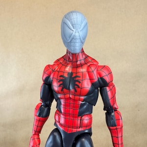 Custom SPIDER-MAN (McFarlane era) 8k resin head. Sculpt by JCirion3d and produced at the Los Angeles studio.
6 inch scale on a Legends figure
