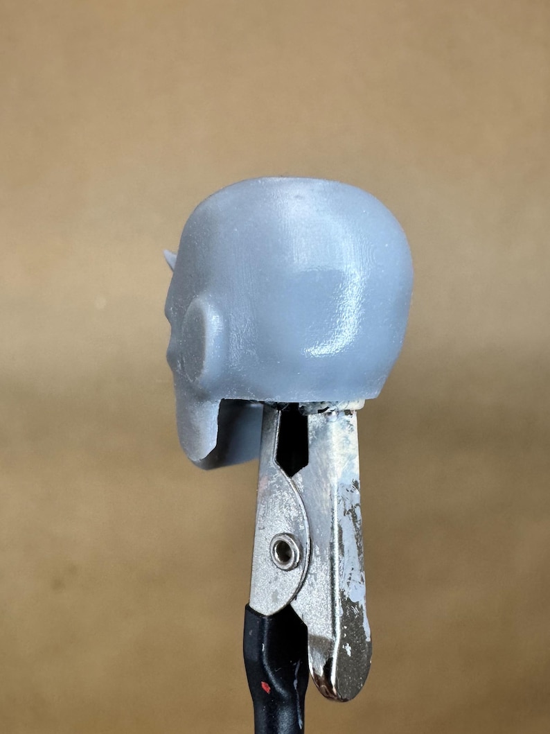 Custom DAREDEVIL (Waid/ Samnee) head in 8k resin. Sculpt by Orobus and produced at the Los Angeles studio. 
Back view.