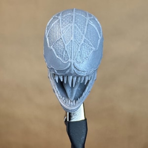 Custom VENOM resin Head, inspired by the Raimi Spider-Man movie. Sculpt by JCirion3d, and produced by me in my Los Angeles studio. 
Front view.
