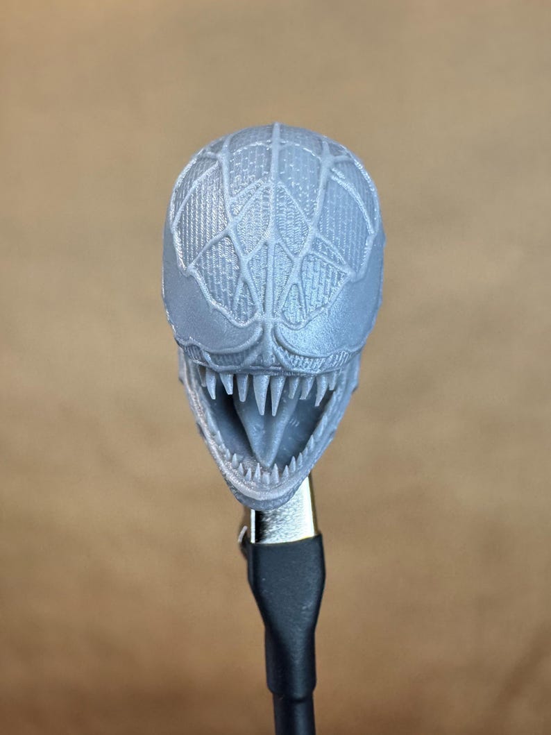 Custom VENOM resin Head, inspired by the Raimi Spider-Man movie. Sculpt by JCirion3d, and produced by me in my Los Angeles studio. 
Front view.