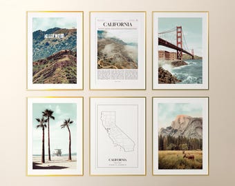 May include: Six framed art prints with gold borders. The prints feature scenic views of California, including the Hollywood sign, Golden Gate Bridge, palm trees, a California map, and a mountain landscape.