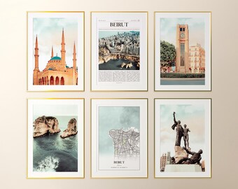 May include: Six framed art prints featuring images of Beirut, Lebanon. The prints include a mosque, a cityscape, a clock tower, sea cliffs, a map, and a statue. Each print is in a gold frame, with a white border, and a light background.