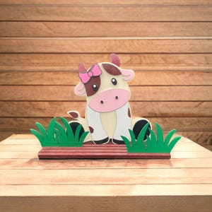 Interchangeable handmade seasonal wooden decorative cow