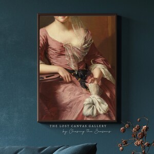 May include: A painting of a woman wearing a pink dress and a white lace shawl. She is holding a white handkerchief in her right hand. The painting has a dark background.