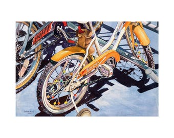 May include: Watercolor painting of two bicycles. One is a vintage orange and white bike with the words "Wind Rider" on the frame. The other bike is gray with the word "Huffy" on the frame. The bikes are parked on a light blue surface.