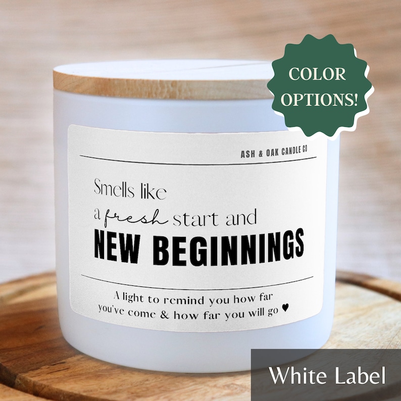 A white jar candle with a brown wooden top