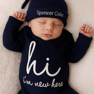 sachin and babi light blue dress The Cutest Newborn Hospital Outfits of 2026, According to Parents main image 0