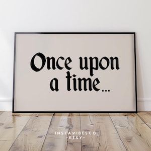 May include: A black and white printable wall art print with the text "Once upon a time..." in a black gothic font on a beige background.